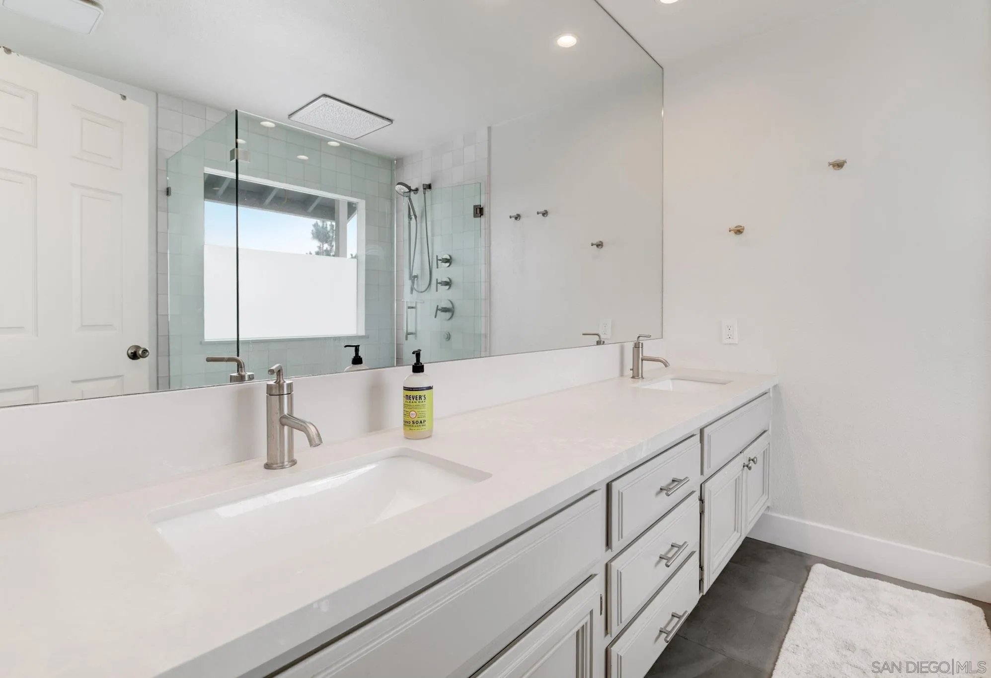 418 Summer View Circle Encinitas, CA 92024 - Photo 18 of 30 a bathroom with a sink and a mirror