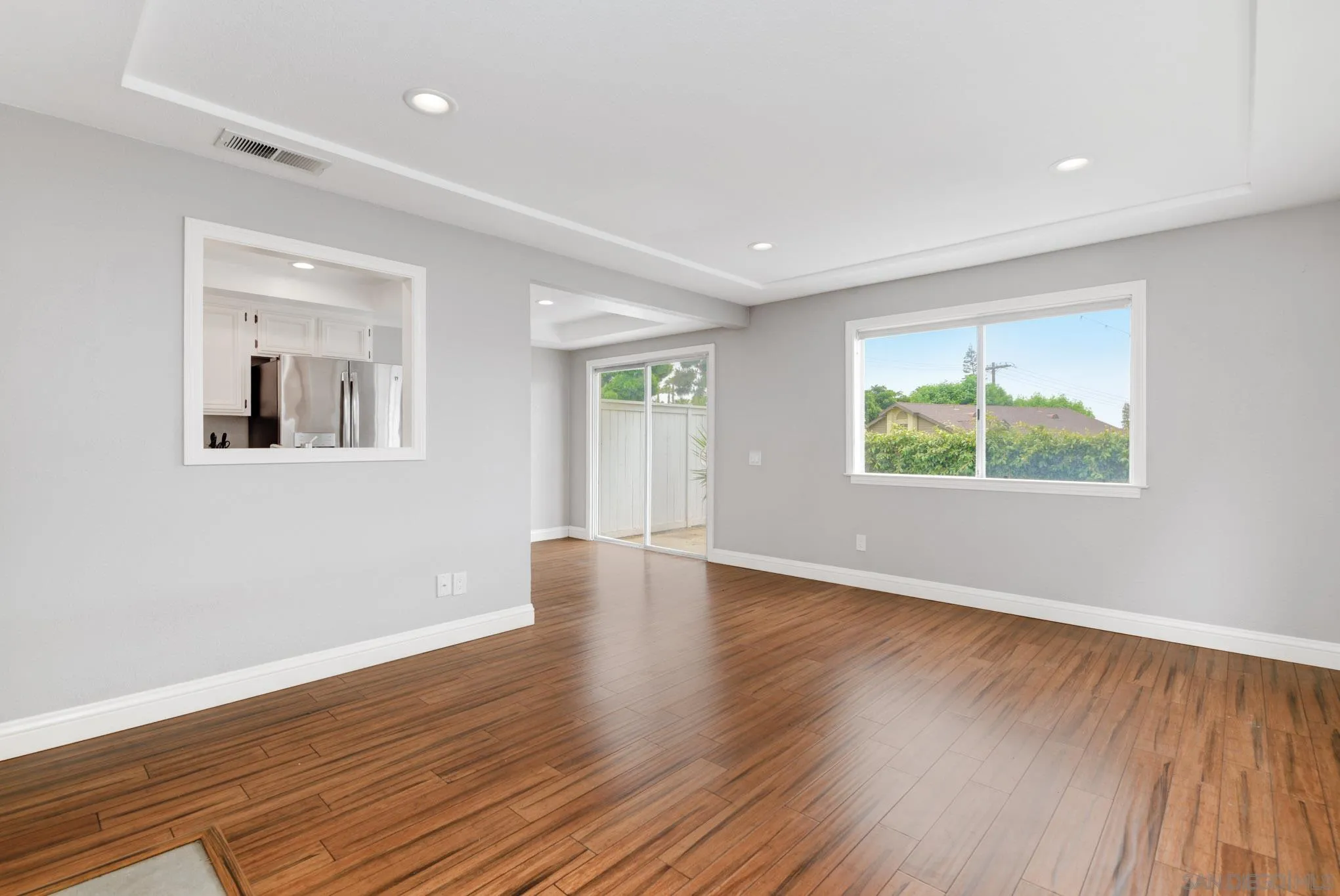 418 Summer View Circle Encinitas, CA 92024 - Photo 2 of 30 a view of an empty room with wooden floor and a window