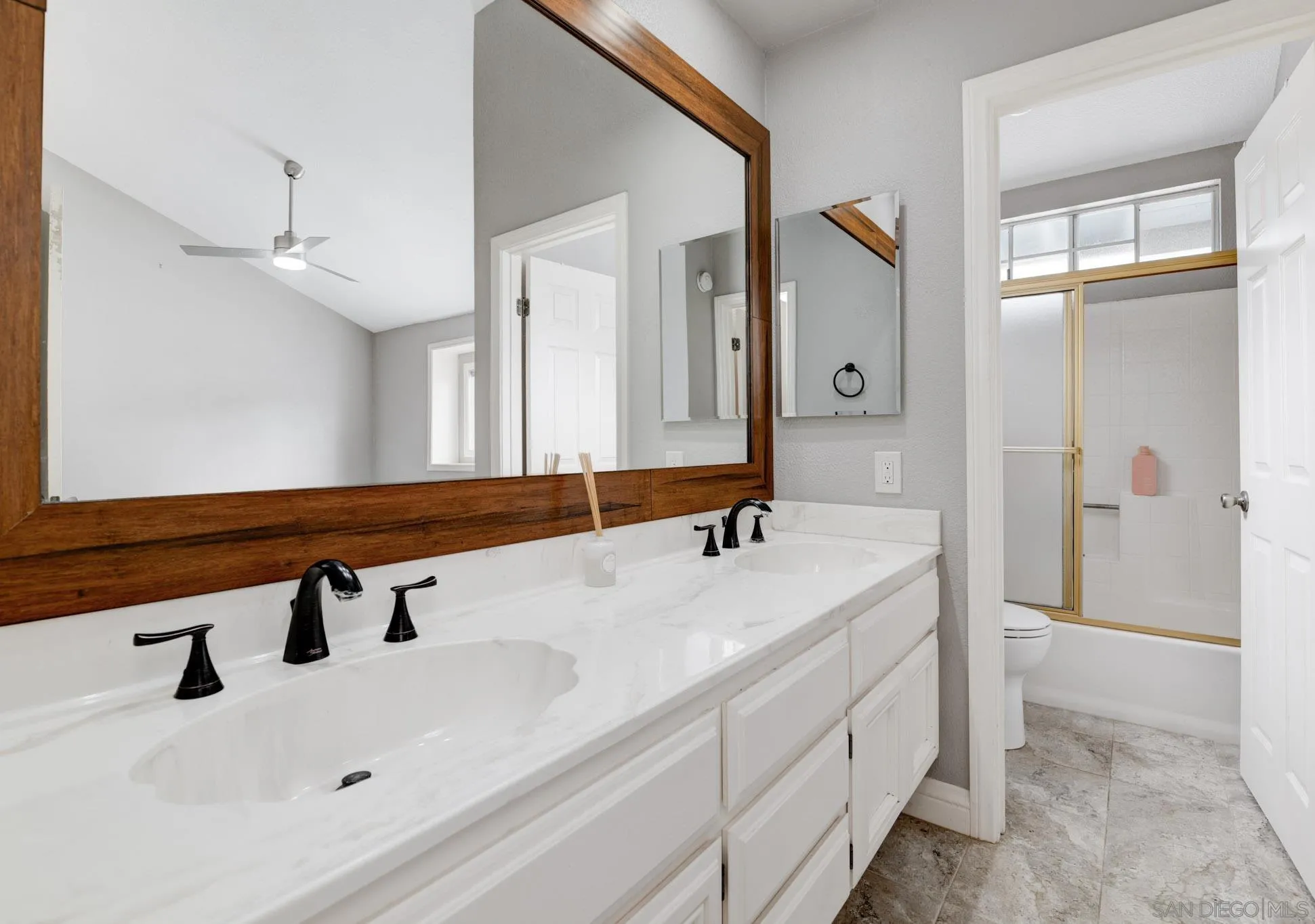 418 Summer View Circle Encinitas, CA 92024 - Photo 23 of 30 a bathroom with a sink and a mirror