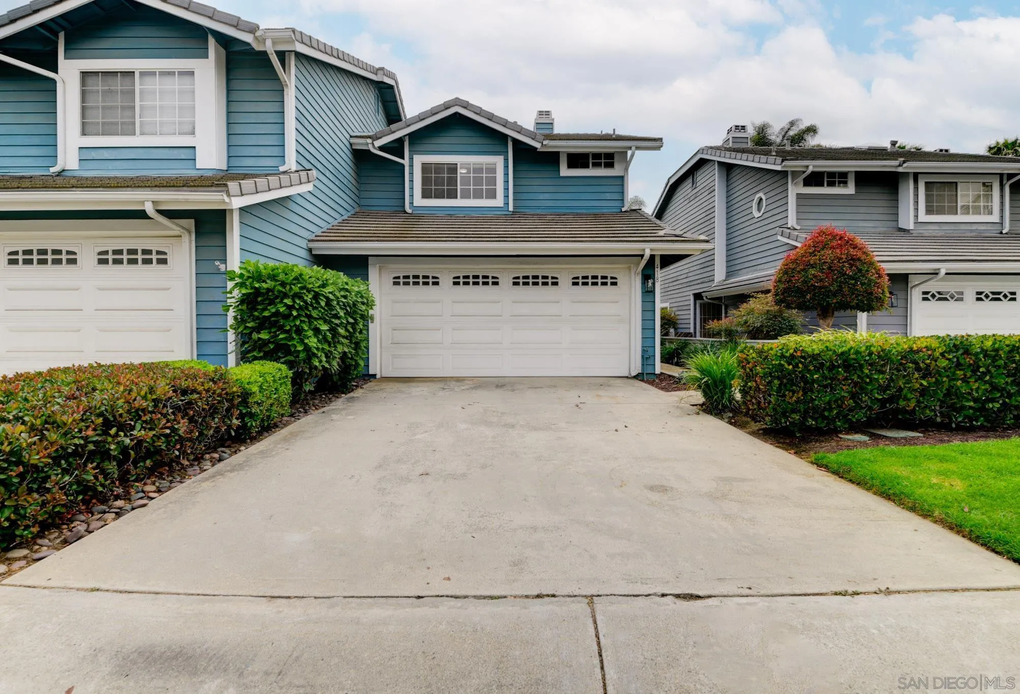 418 Summer View Circle Encinitas, CA 92024 - Photo 28 of 30 a front view of a house with a yard and garage