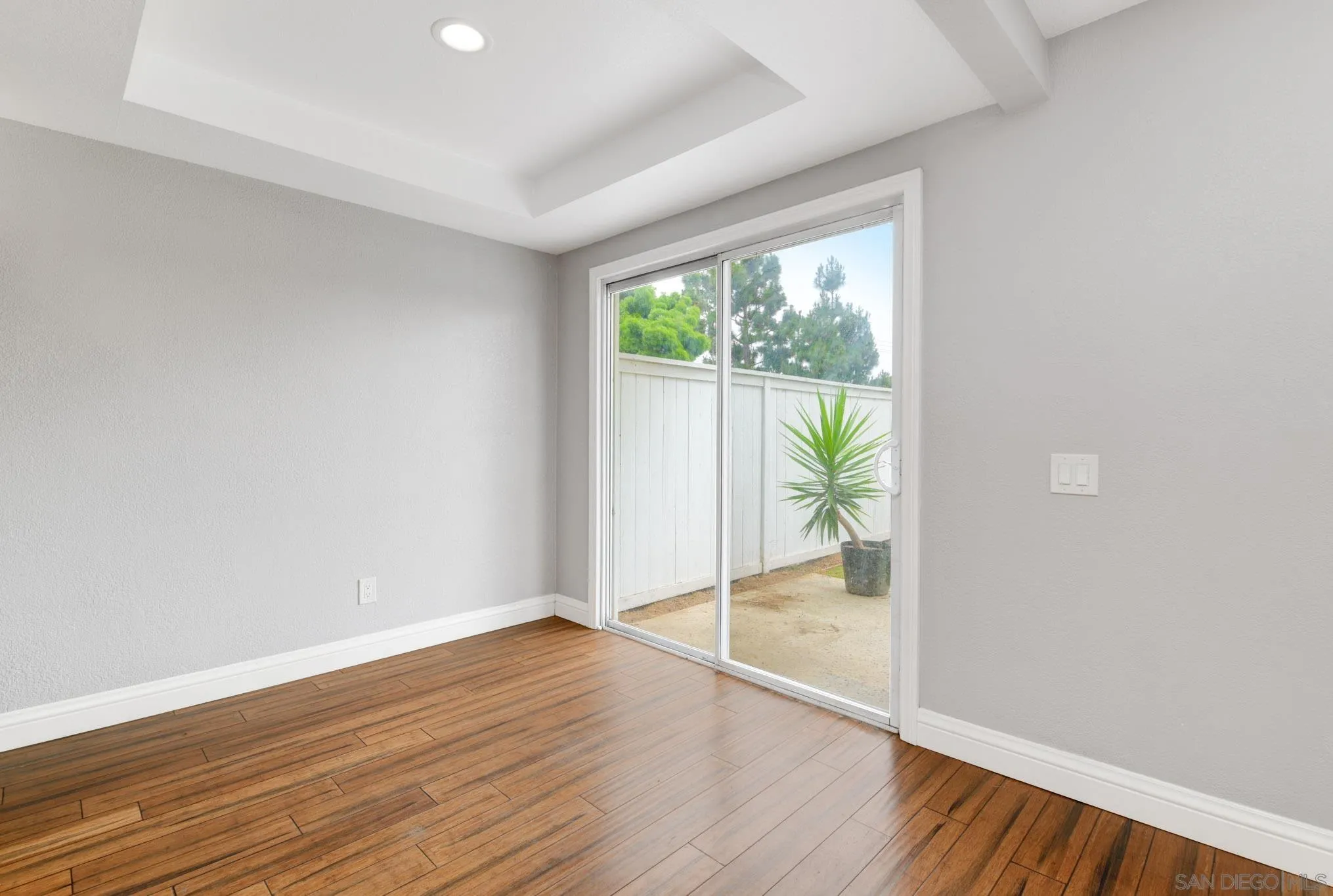 418 Summer View Circle Encinitas, CA 92024 - Photo 6 of 30 a view of an empty room with wooden floor and a window