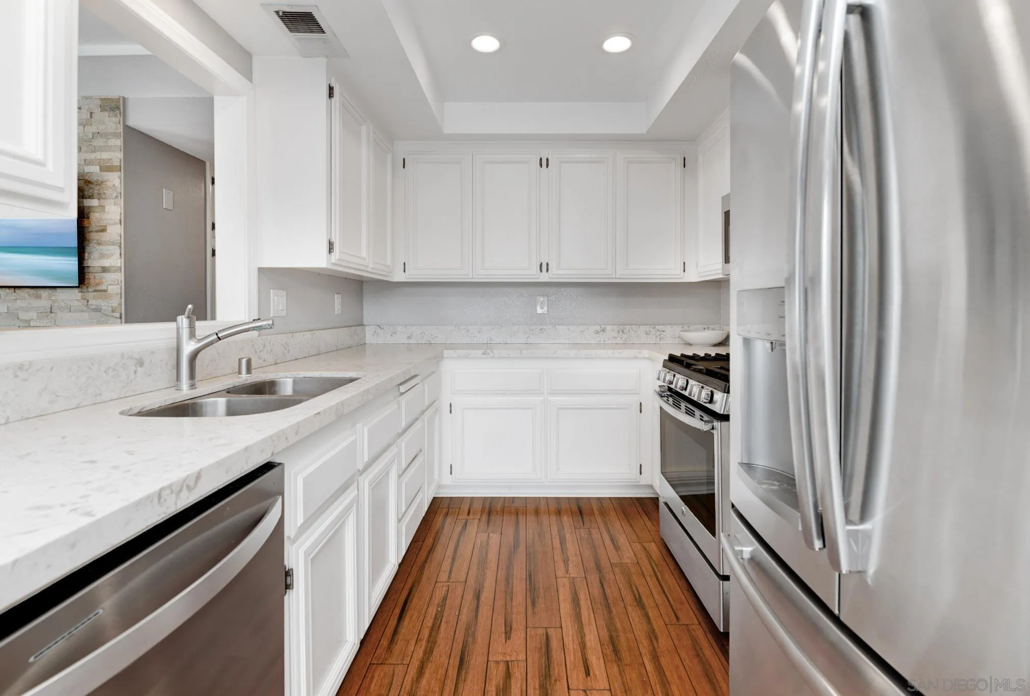 418 Summer View Circle Encinitas, CA 92024 - Photo 10 of 30 a kitchen with a sink stove and cabinets