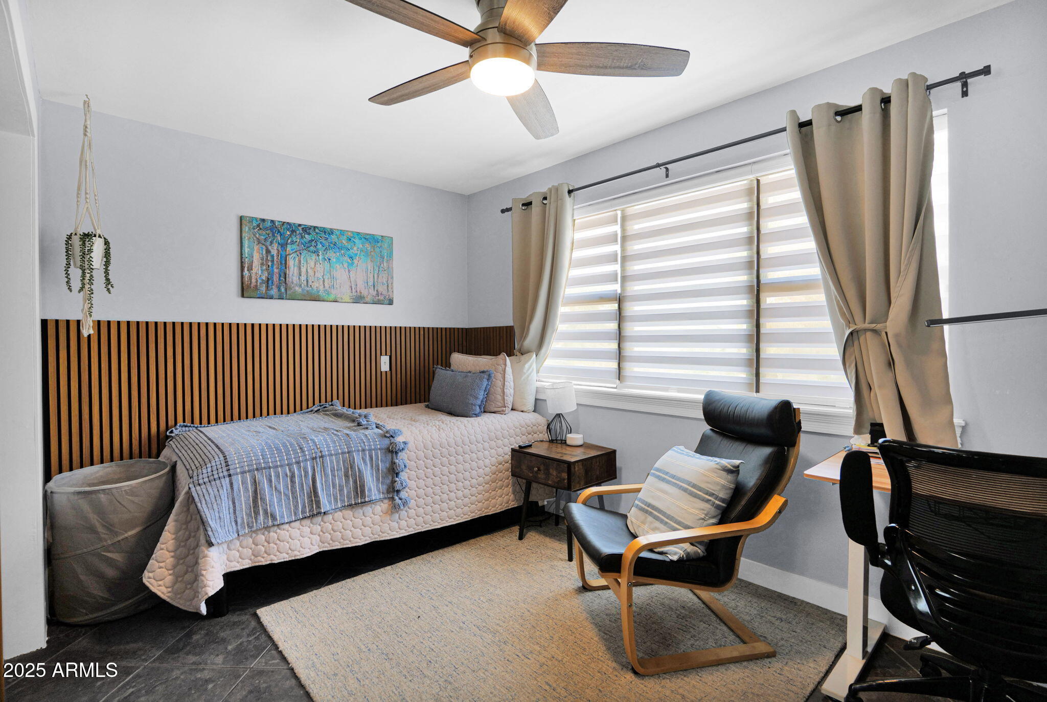 3217 East Flower Street Phoenix, AZ 85018 - Photo 21 of 60 a living room with furniture and a window