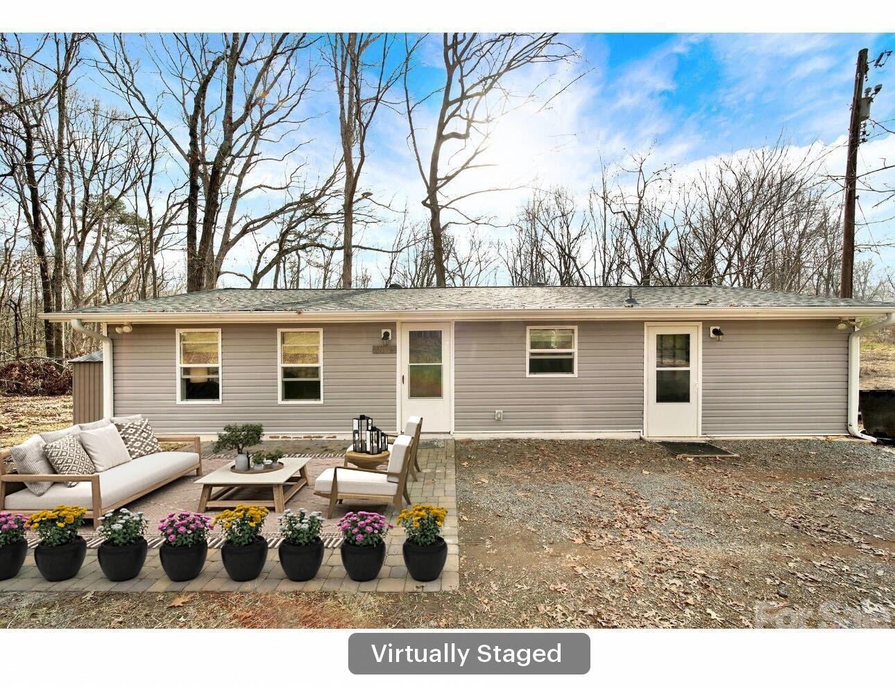2503 Lancaster Highway Monroe, NC 28112 - Photo 1 of 26 a view of a backyard with a patio