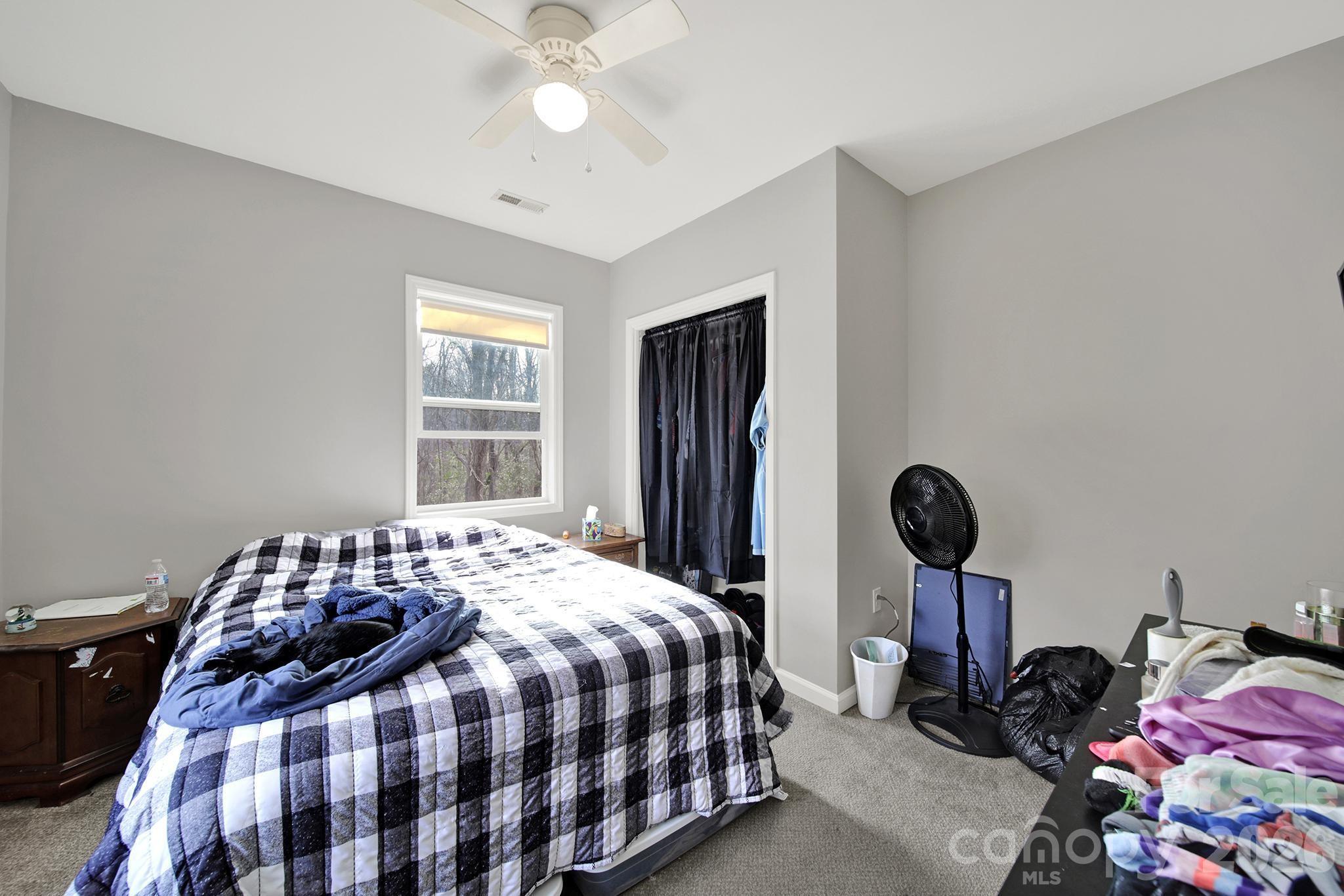 2503 Lancaster Highway Monroe, NC 28112 - Photo 11 of 26 a bedroom with bed and a window