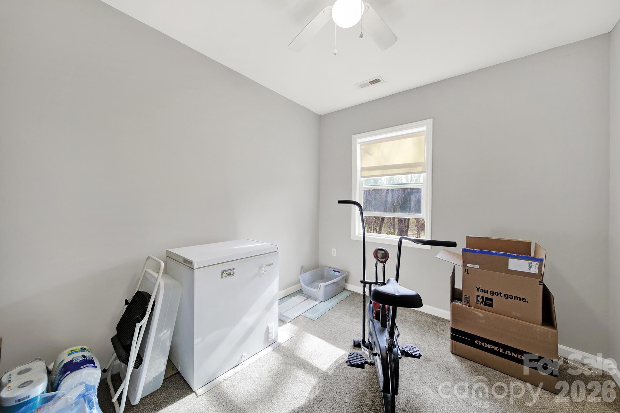 2503 Lancaster Highway Monroe, NC 28112 - Photo 12 of 26 a view of a workspace with furniture and a window
