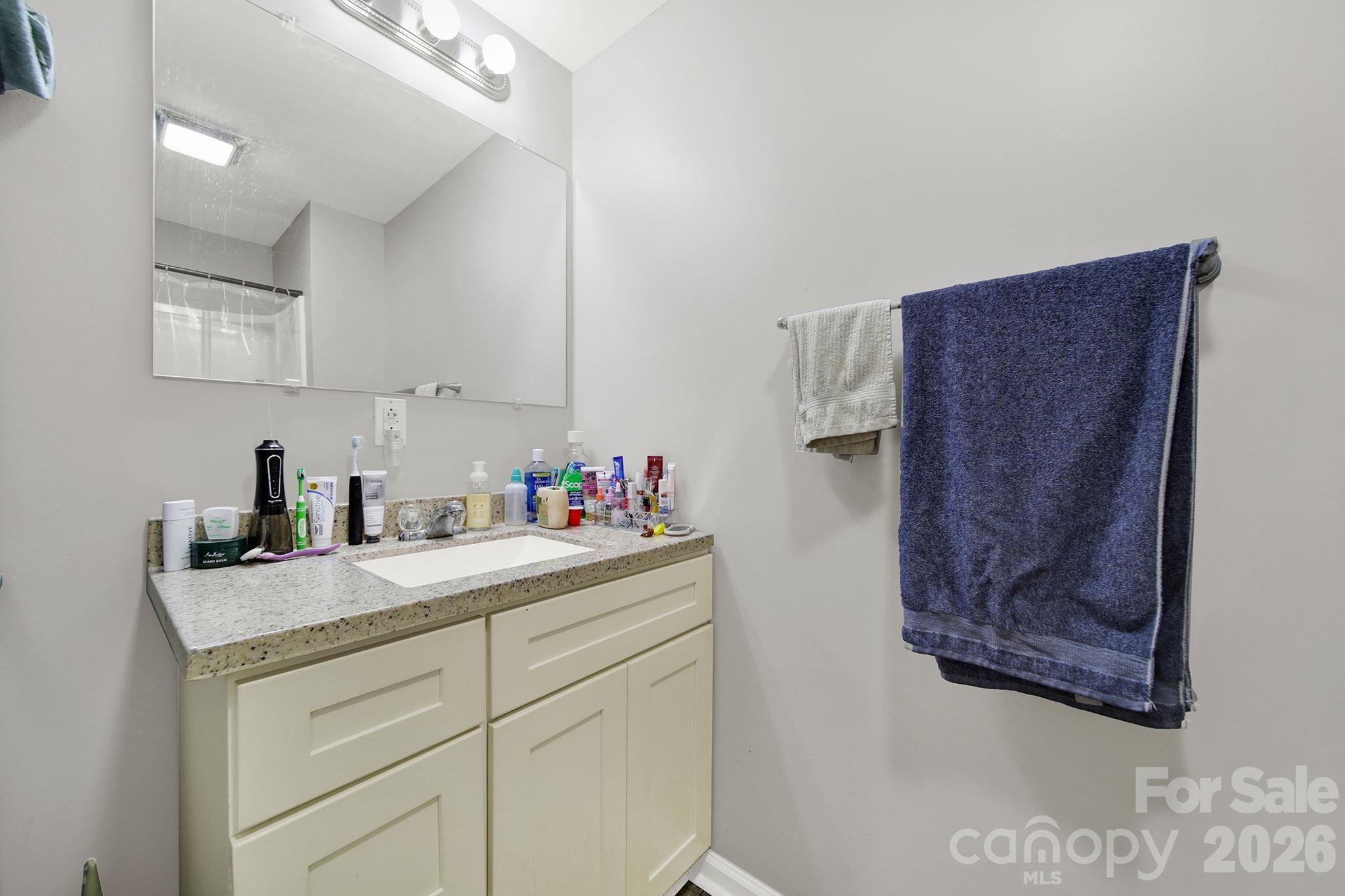 2503 Lancaster Highway Monroe, NC 28112 - Photo 14 of 26 a kitchen with a sink and cabinets