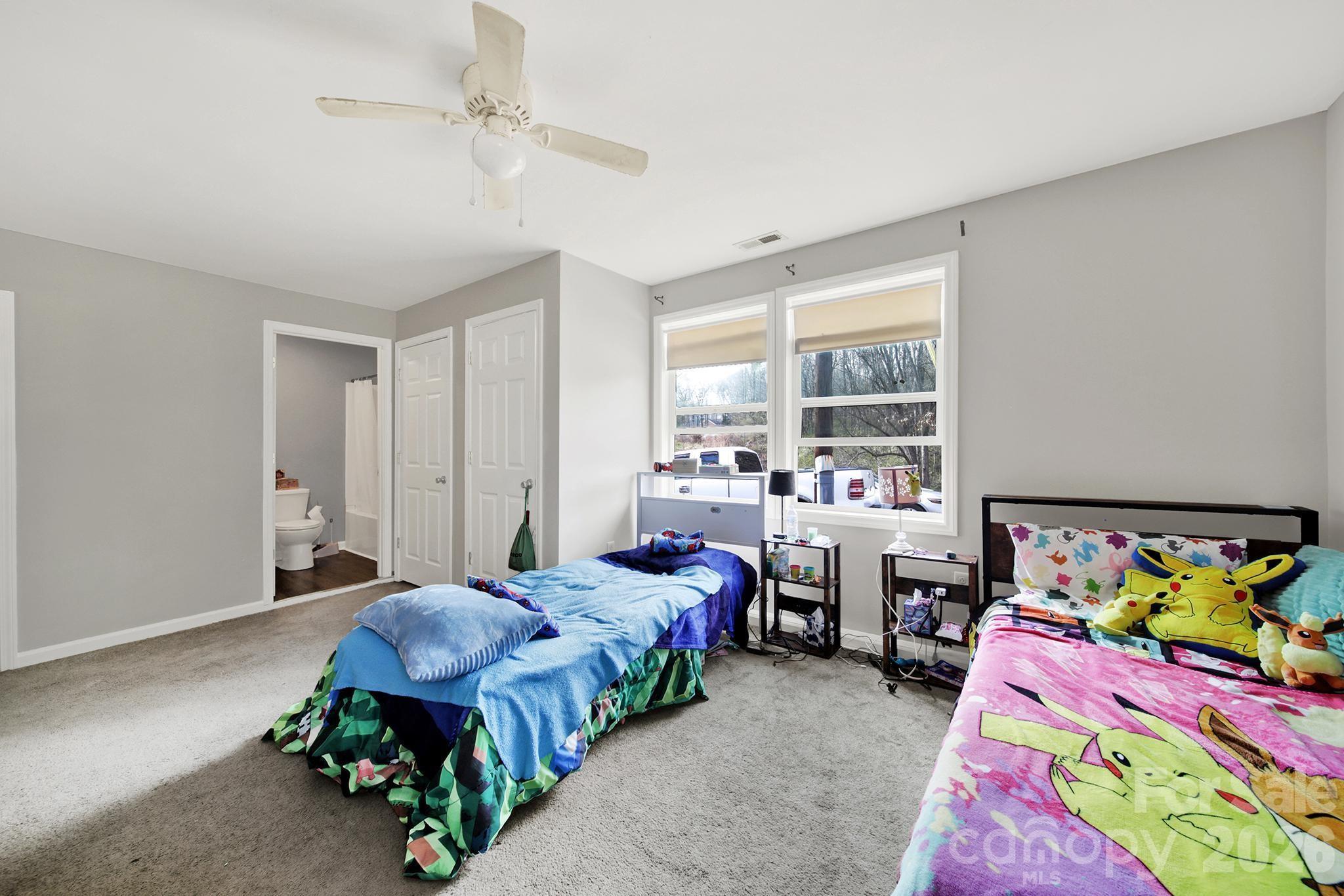 2503 Lancaster Highway Monroe, NC 28112 - Photo 17 of 26 a bedroom with bed and window