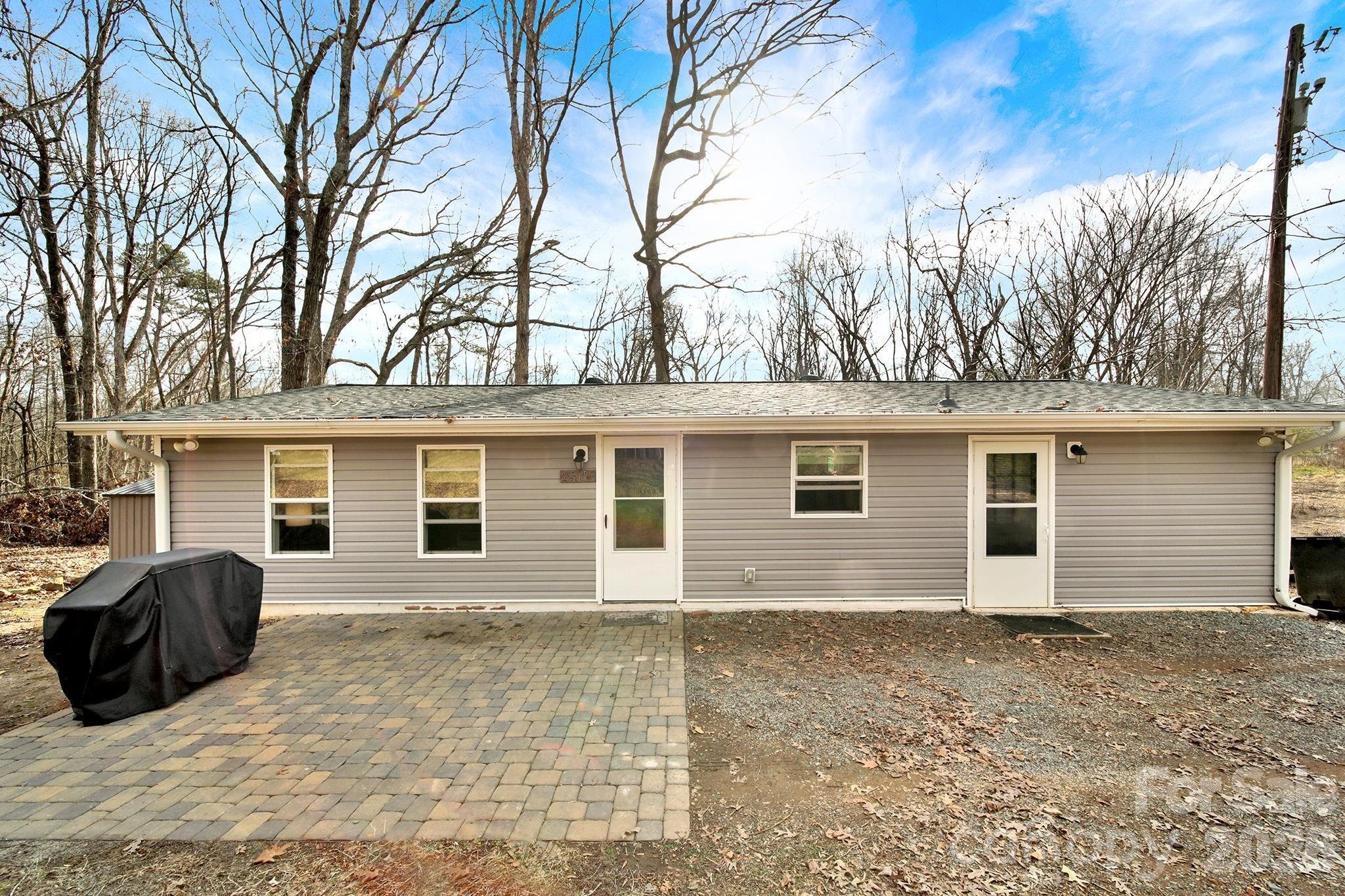 2503 Lancaster Highway Monroe, NC 28112 - Photo 2 of 26 front view of a house with a yard