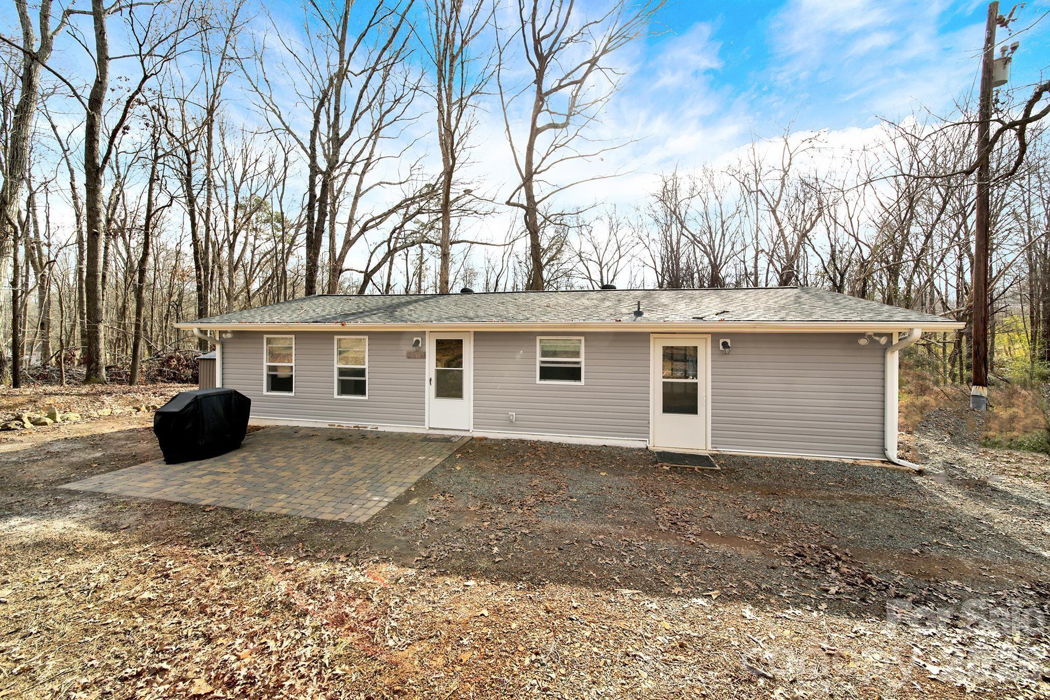2503 Lancaster Highway Monroe, NC 28112 - Photo 23 of 26 a view of a house with a yard covered in snow