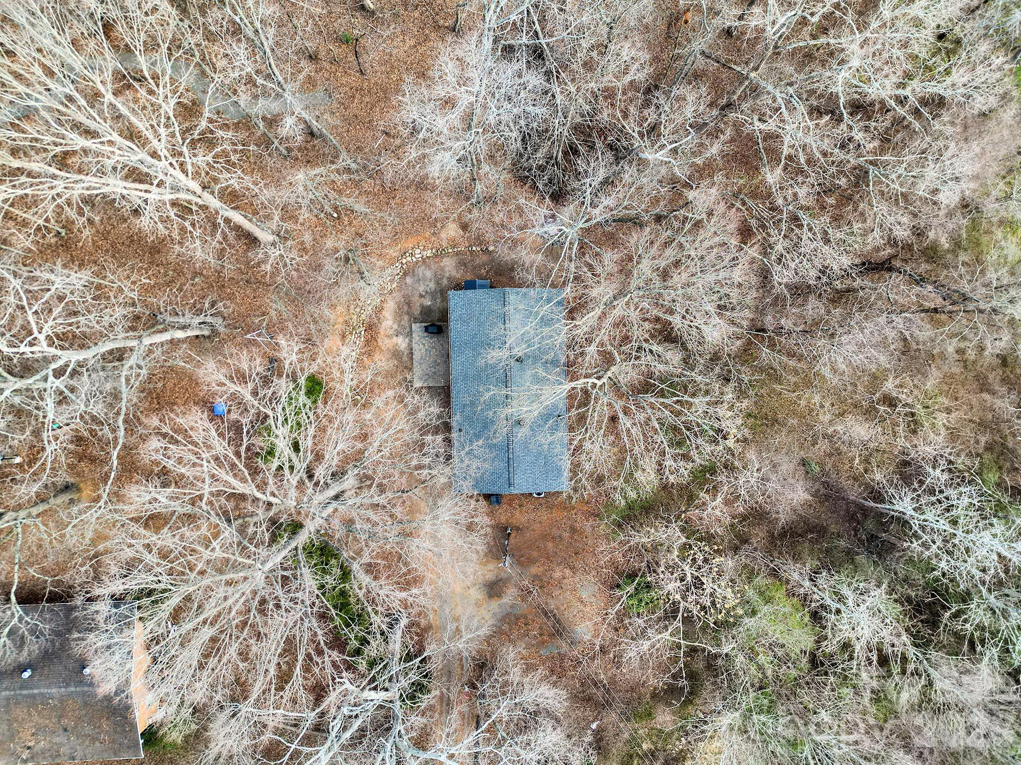 2503 Lancaster Highway Monroe, NC 28112 - Photo 25 of 26 a brick building with a trees