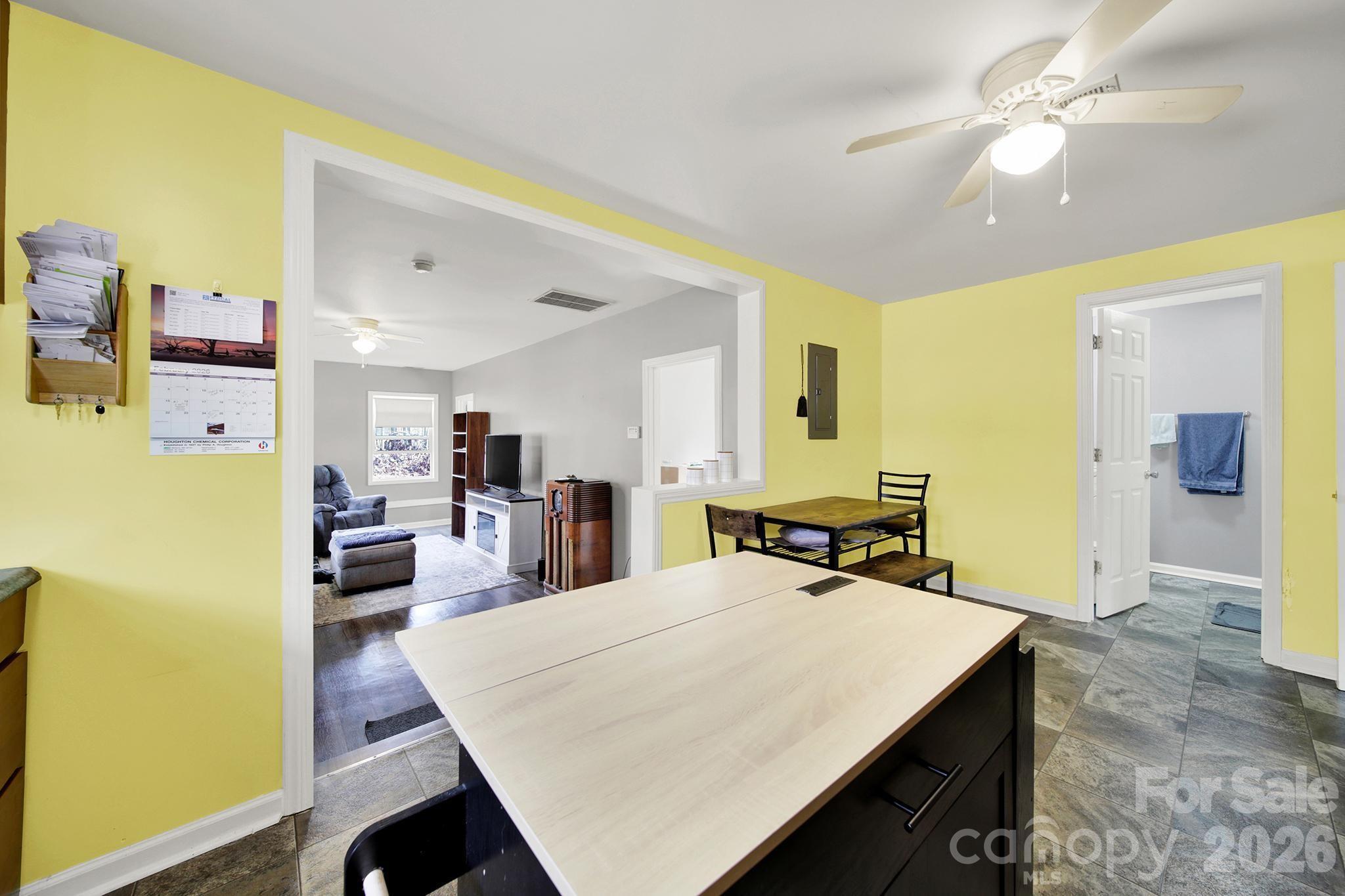 2503 Lancaster Highway Monroe, NC 28112 - Photo 10 of 26 a room with a bed and a table