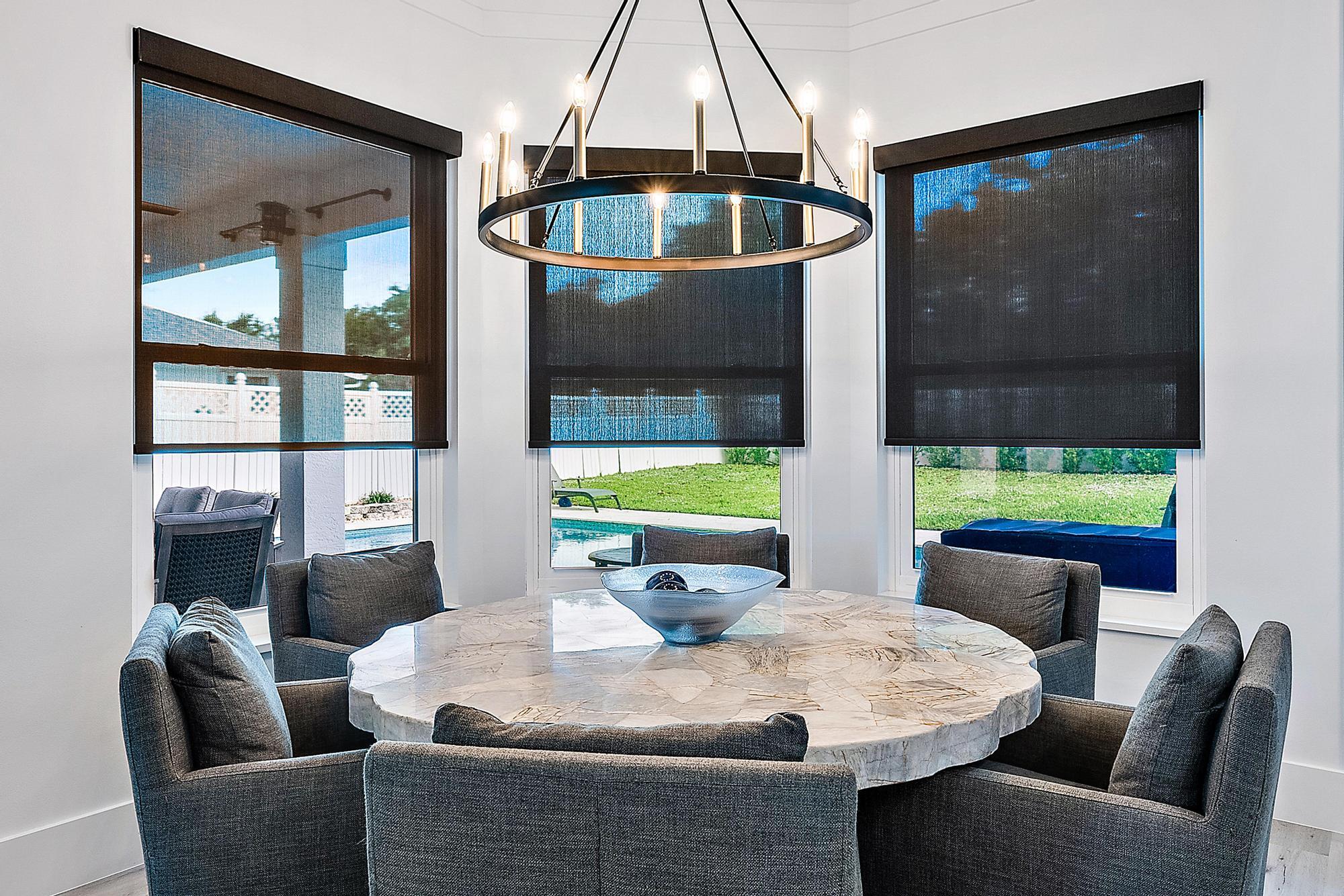 596 North Cypress Drive Tequesta, FL 33469 - Photo 10 of 28 a living room with furniture and a window