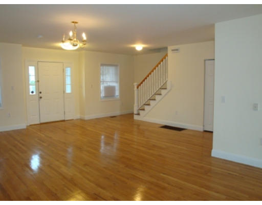 37 Lund Road Medford, MA 02155 - Photo 7 of 13 a view of an empty room and chandelier fan