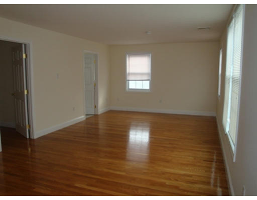 37 Lund Road Medford, MA 02155 - Photo 8 of 13 a view of room with window and wooden floor