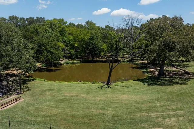 a view of a park with welcome board