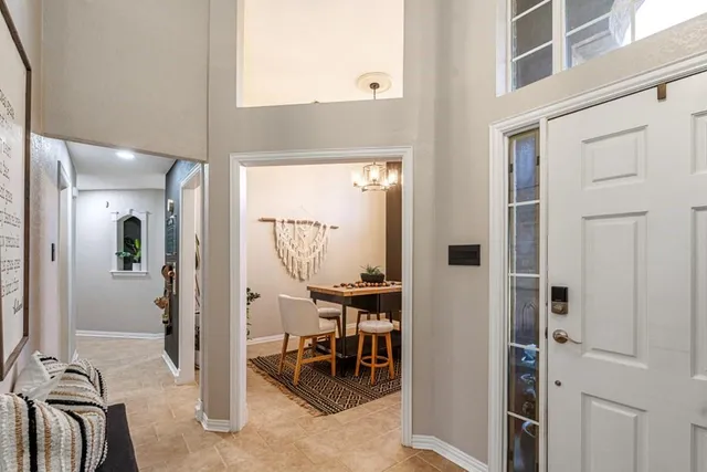 a view of a livingroom with furniture and windows
