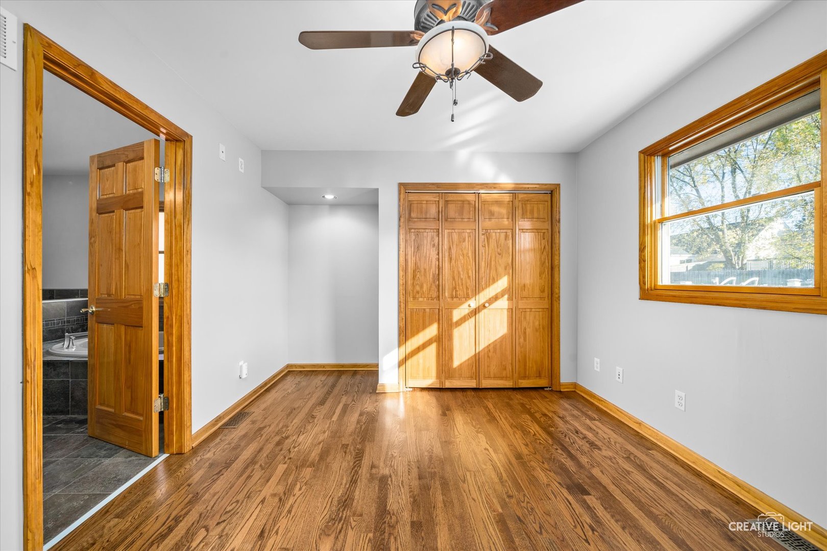 1111 Laurel Drive Aurora, IL 60506 - Photo 12 of 22 a view of room with wooden floor and window