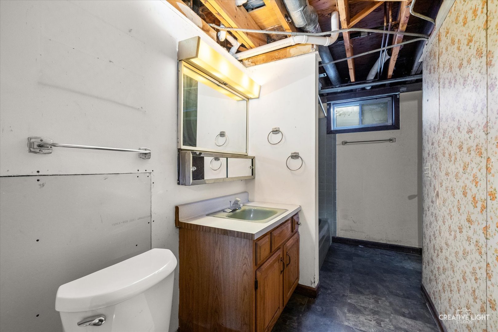 1111 Laurel Drive Aurora, IL 60506 - Photo 21 of 22 a bathroom with a granite countertop sink toilet and shower