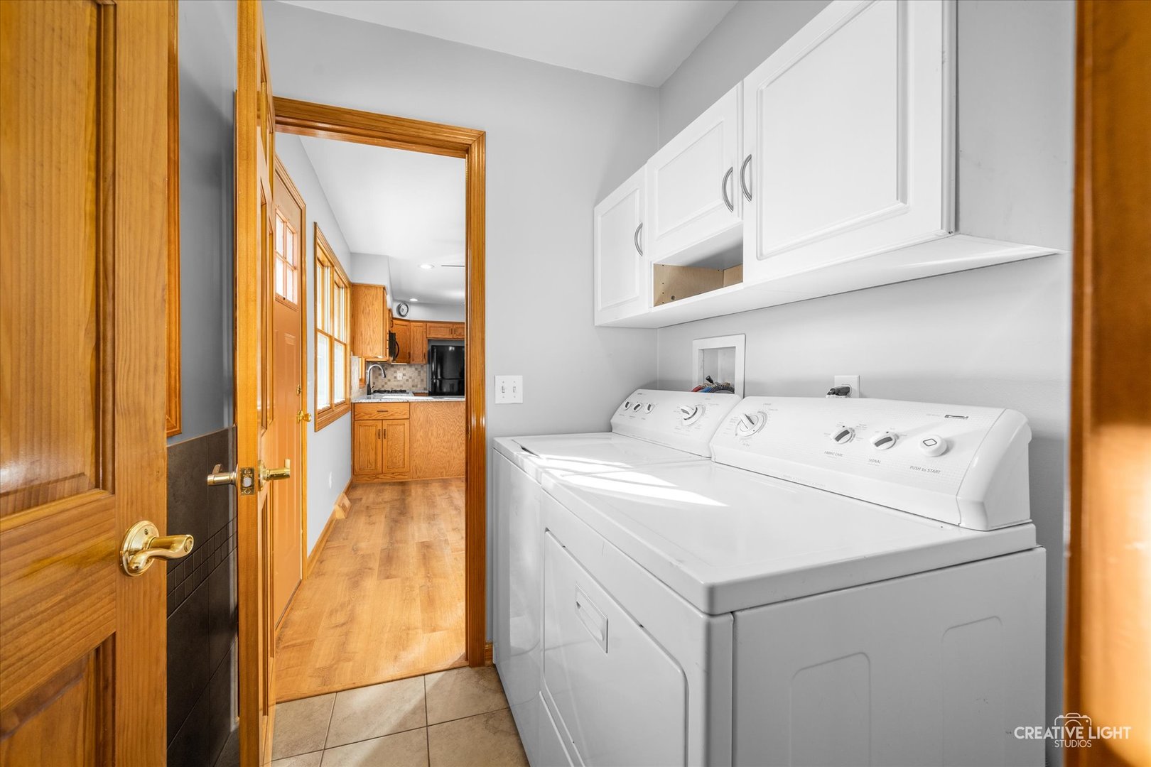 1111 Laurel Drive Aurora, IL 60506 - Photo 8 of 22 a utility room with dryer and washer