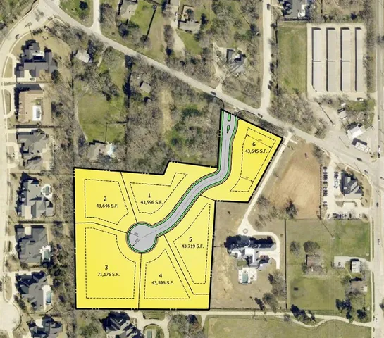 an aerial view of a city with lots of residential buildings