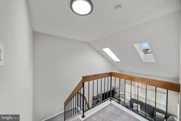 a view of a livingroom with a staircase
