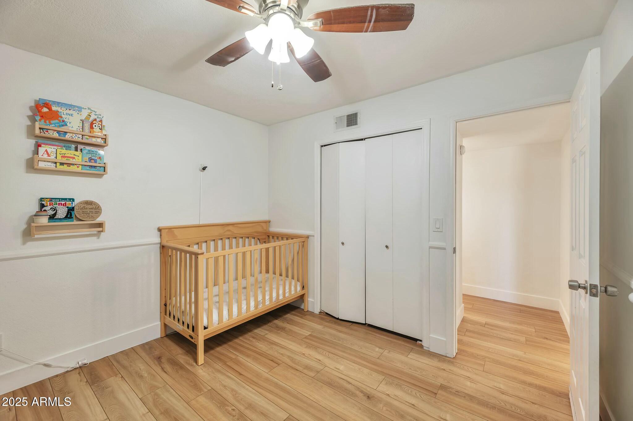 623 West Guadalupe Road, Unit 213 Mesa, AZ 85210 - Photo 11 of 21 a view of a room with toys and a chandelier fan