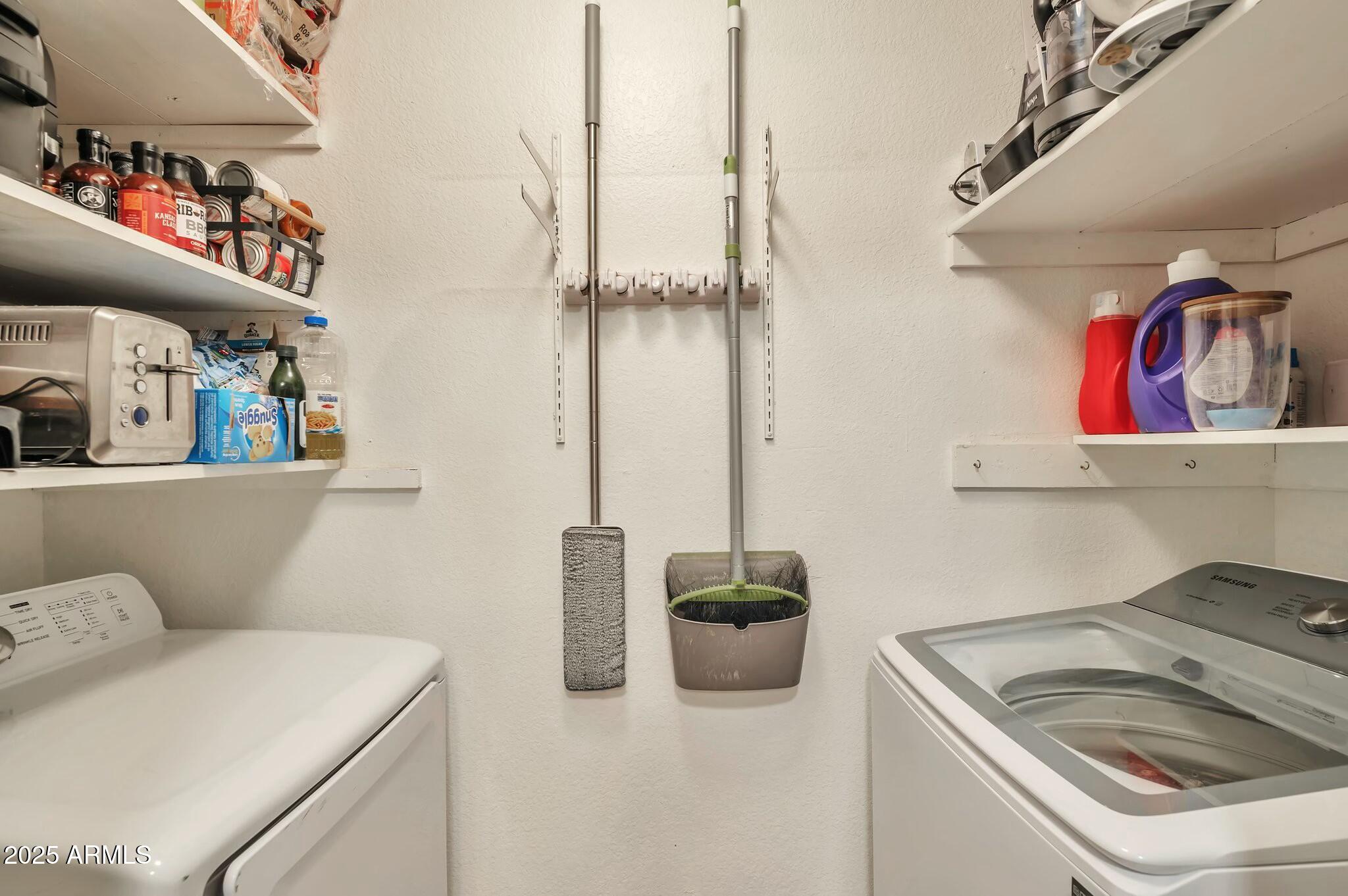 623 West Guadalupe Road, Unit 213 Mesa, AZ 85210 - Photo 7 of 21 a utility room with dryer and washer