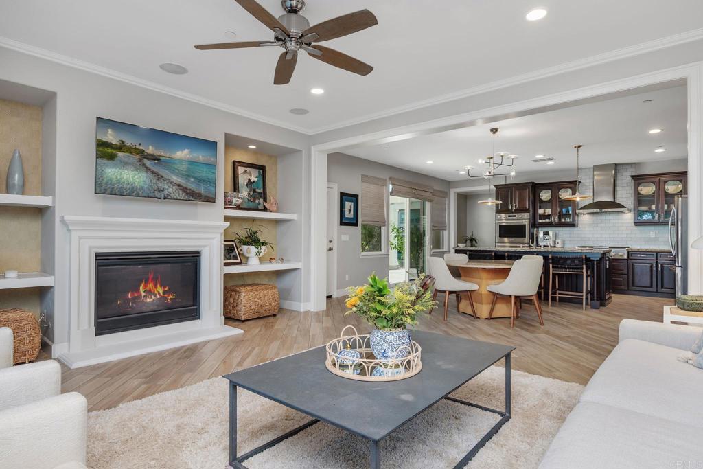 13525 Cielo Ranch Road San Diego, CA 92130 - Photo 11 of 49 a living room with furniture and a fireplace