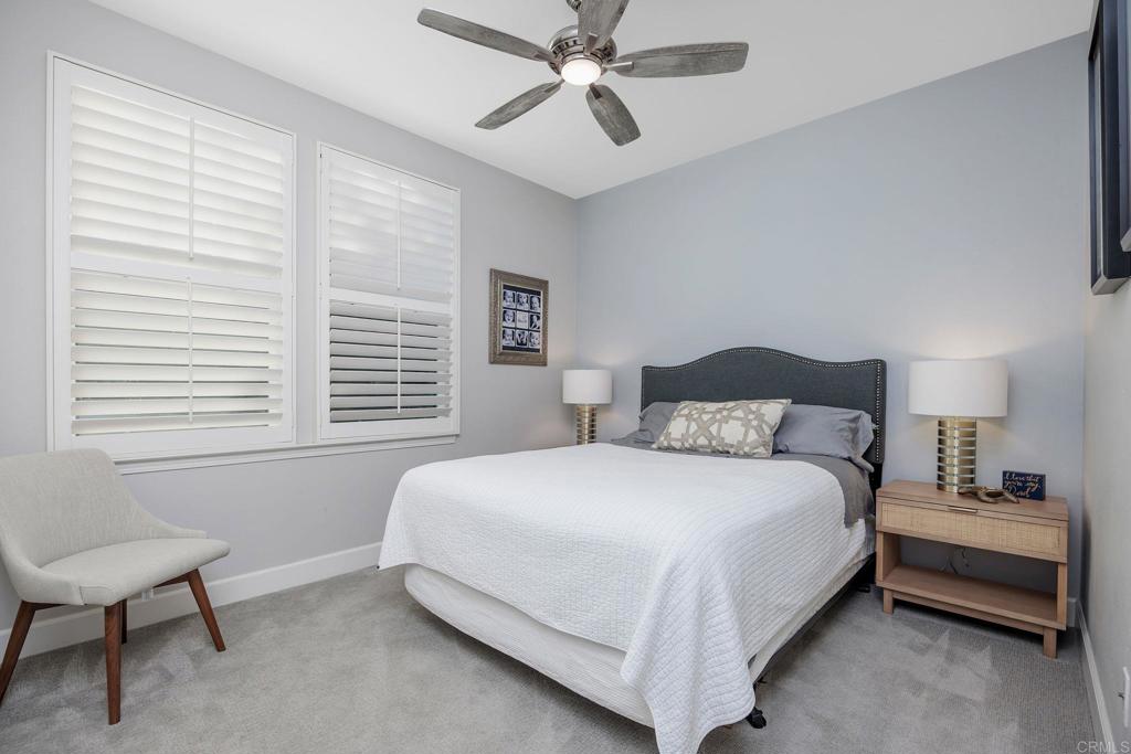13525 Cielo Ranch Road San Diego, CA 92130 - Photo 16 of 49 a bedroom with a bed and a chair
