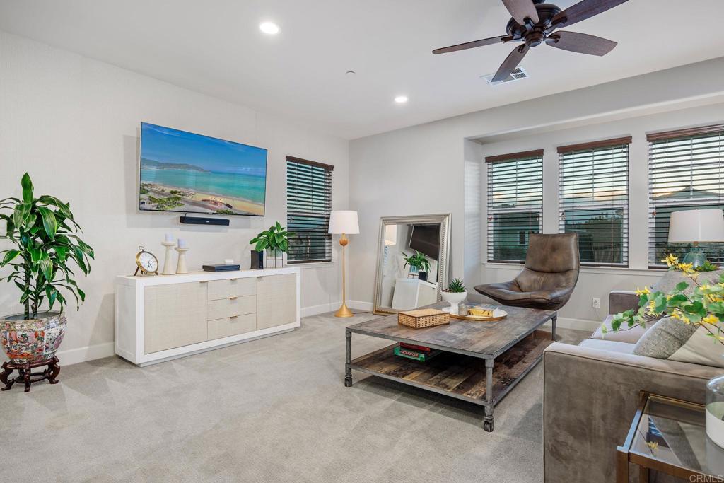 13525 Cielo Ranch Road San Diego, CA 92130 - Photo 18 of 49 a living room with furniture