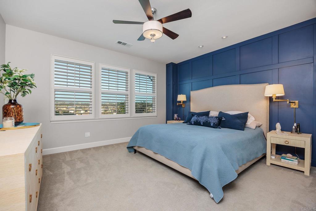 13525 Cielo Ranch Road San Diego, CA 92130 - Photo 20 of 49 a bedroom with a bed dresser and a window