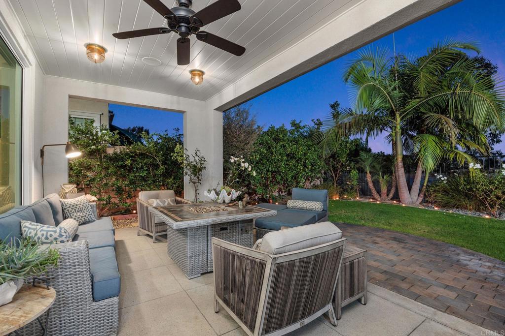 13525 Cielo Ranch Road San Diego, CA 92130 - Photo 2 of 49 a outdoor space with a couch and a potted plant