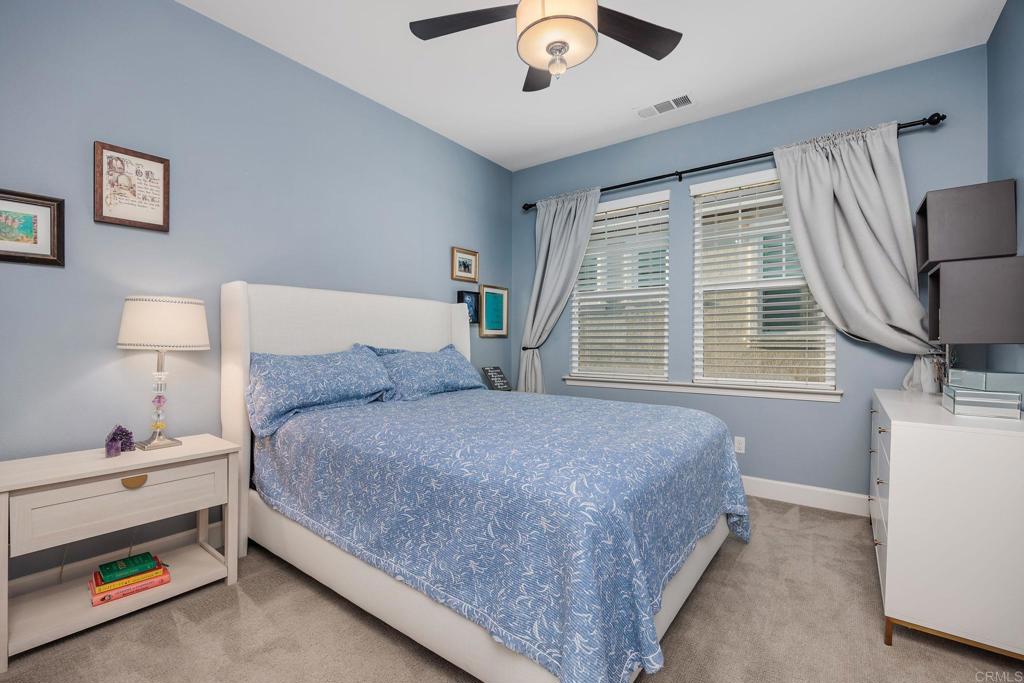 13525 Cielo Ranch Road San Diego, CA 92130 - Photo 26 of 49 a bed room with a bed and a window