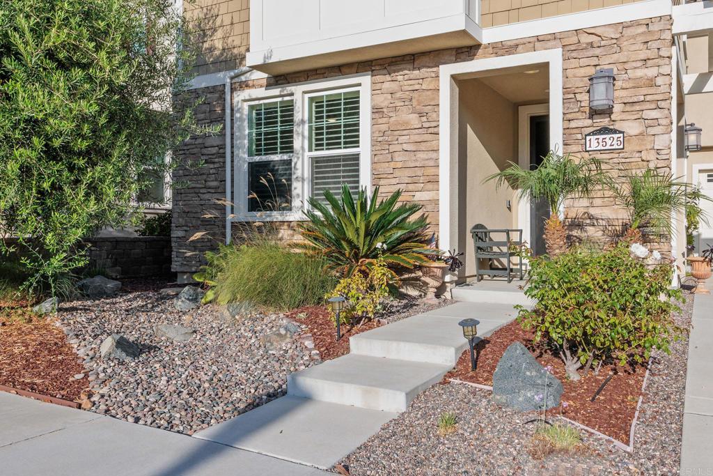 13525 Cielo Ranch Road San Diego, CA 92130 - Photo 29 of 49 a potted plant in front of a house