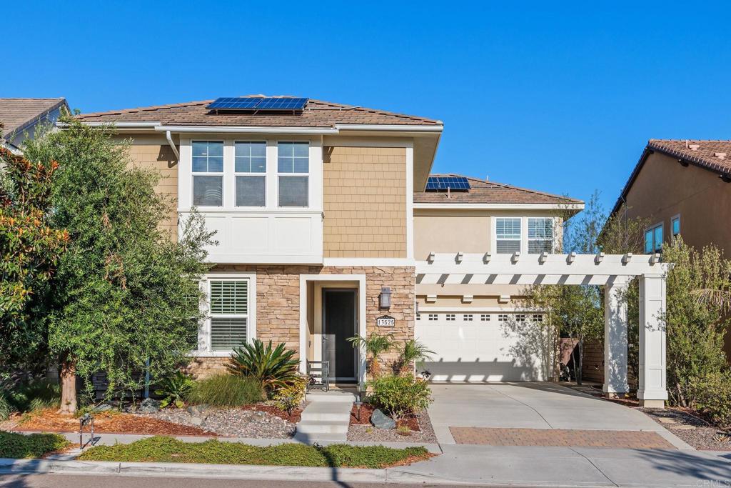 13525 Cielo Ranch Road San Diego, CA 92130 - Photo 30 of 49 a front view of a house with a yard