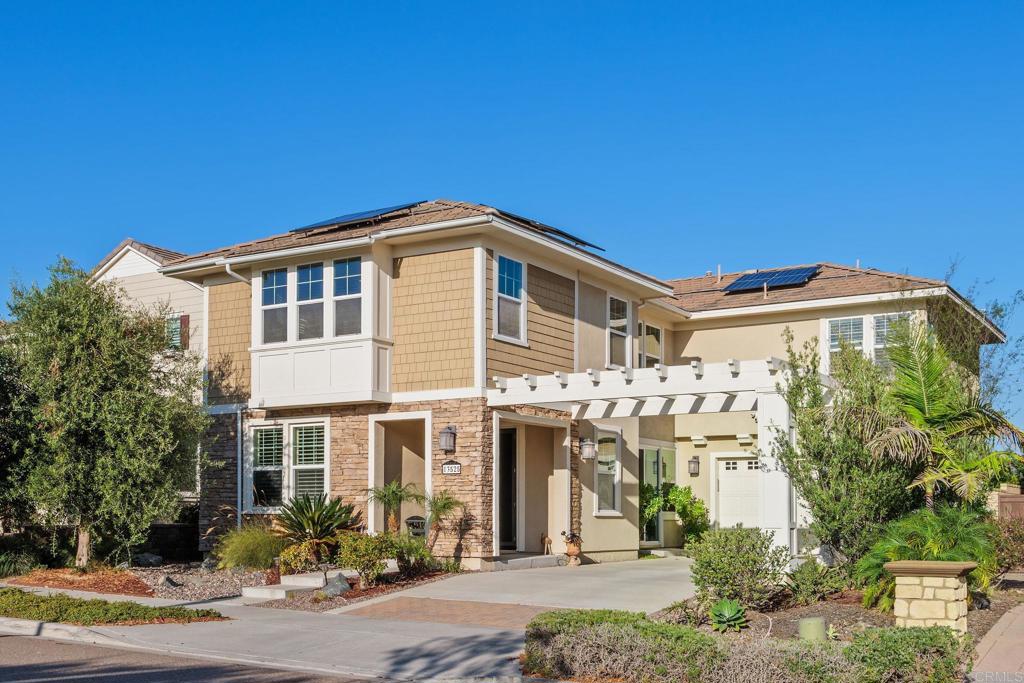 13525 Cielo Ranch Road San Diego, CA 92130 - Photo 31 of 49 a front view of a house with a yard