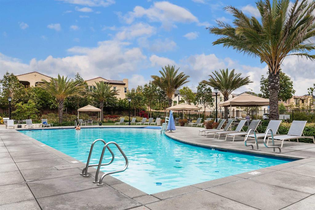 13525 Cielo Ranch Road San Diego, CA 92130 - Photo 39 of 49 a view of a swimming pool and lounge chair