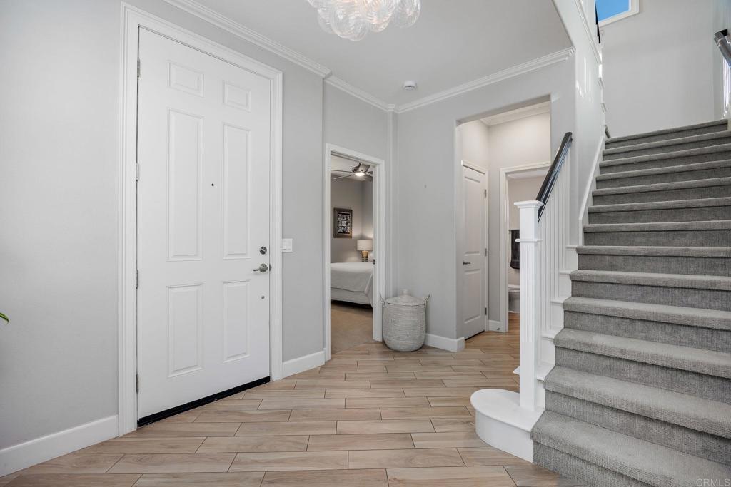 13525 Cielo Ranch Road San Diego, CA 92130 - Photo 47 of 49 a view of an entryway with wooden floor