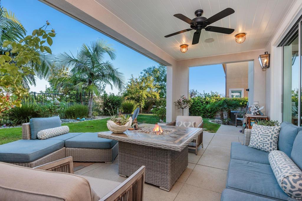 13525 Cielo Ranch Road San Diego, CA 92130 - Photo 8 of 49 a outdoor space with patio couch and a potted plant