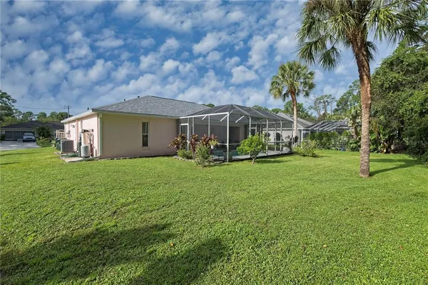 a view of a house with a yard porch and sitting area