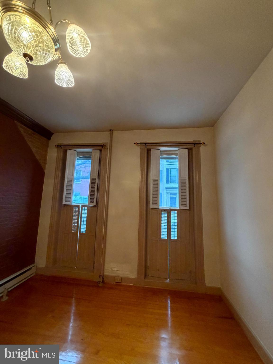 232 East 2nd Street Frederick, MD 21701 - Photo 13 of 40 wooden floor in an empty room