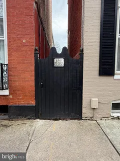 a potted plant in front of a door