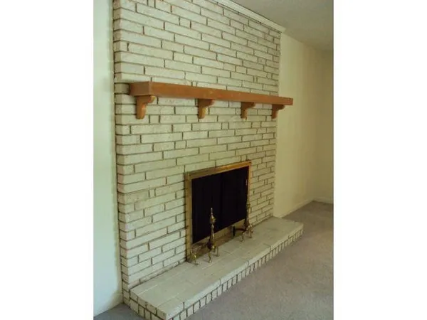 a room with a fireplace