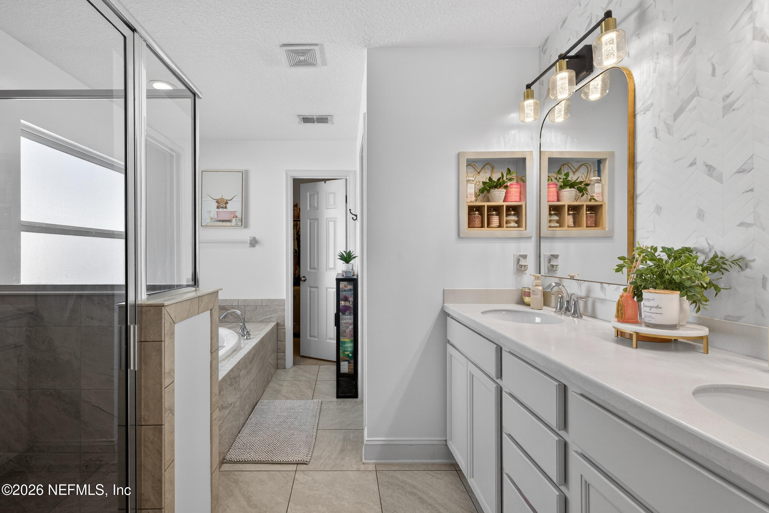 9874 Patriot Ridge Drive Jacksonville, FL 32221 - Photo 13 of 26 a bathroom with a granite countertop sink mirror and a shower