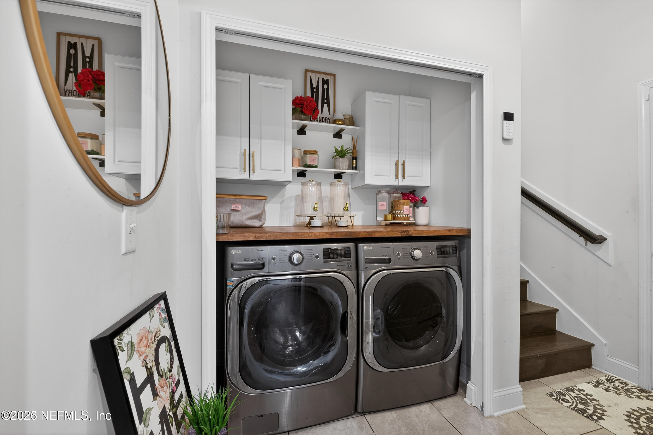9874 Patriot Ridge Drive Jacksonville, FL 32221 - Photo 16 of 26 a view of a hallway with washer and dryer
