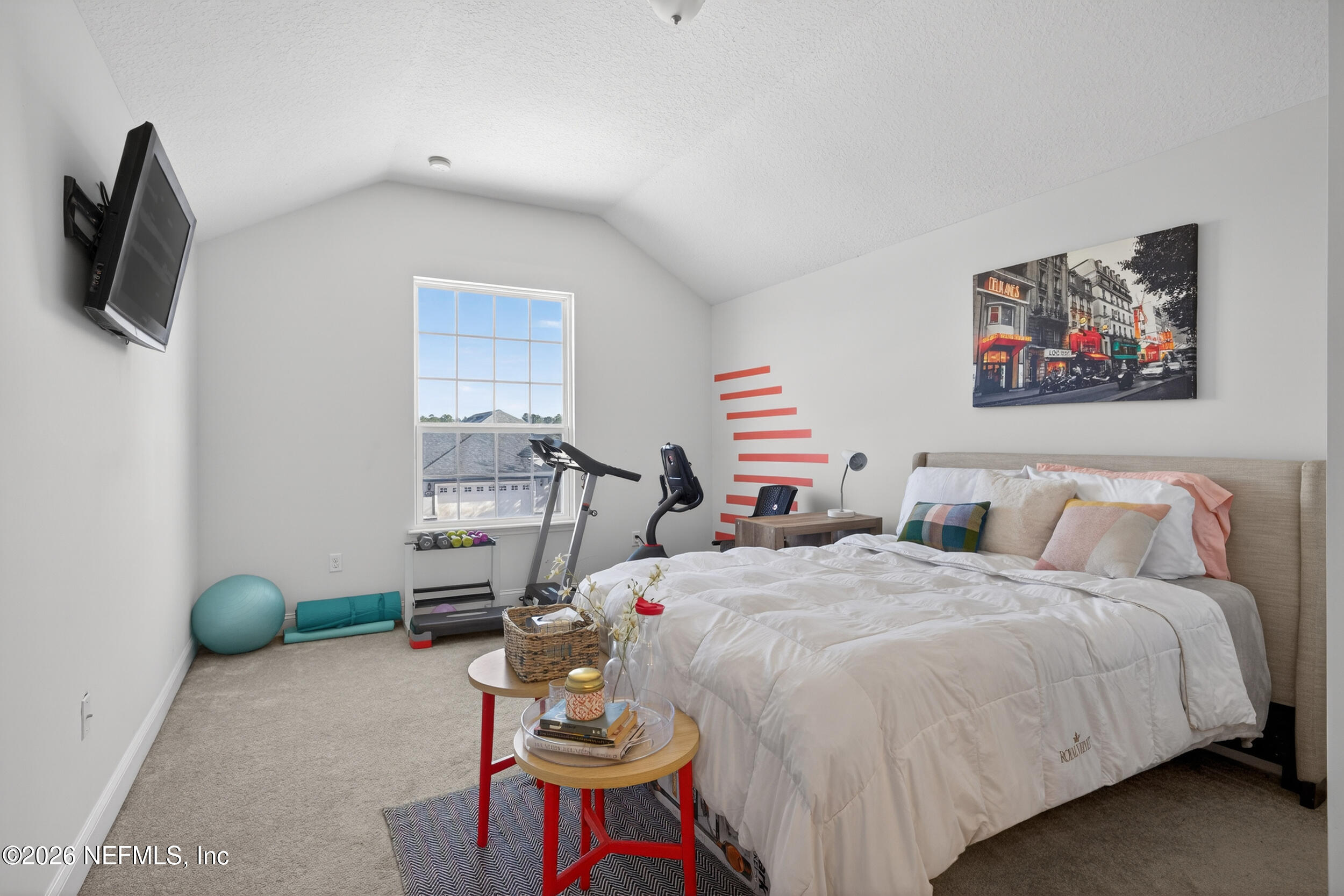 9874 Patriot Ridge Drive Jacksonville, FL 32221 - Photo 17 of 26 a bed room with a bed and a chair