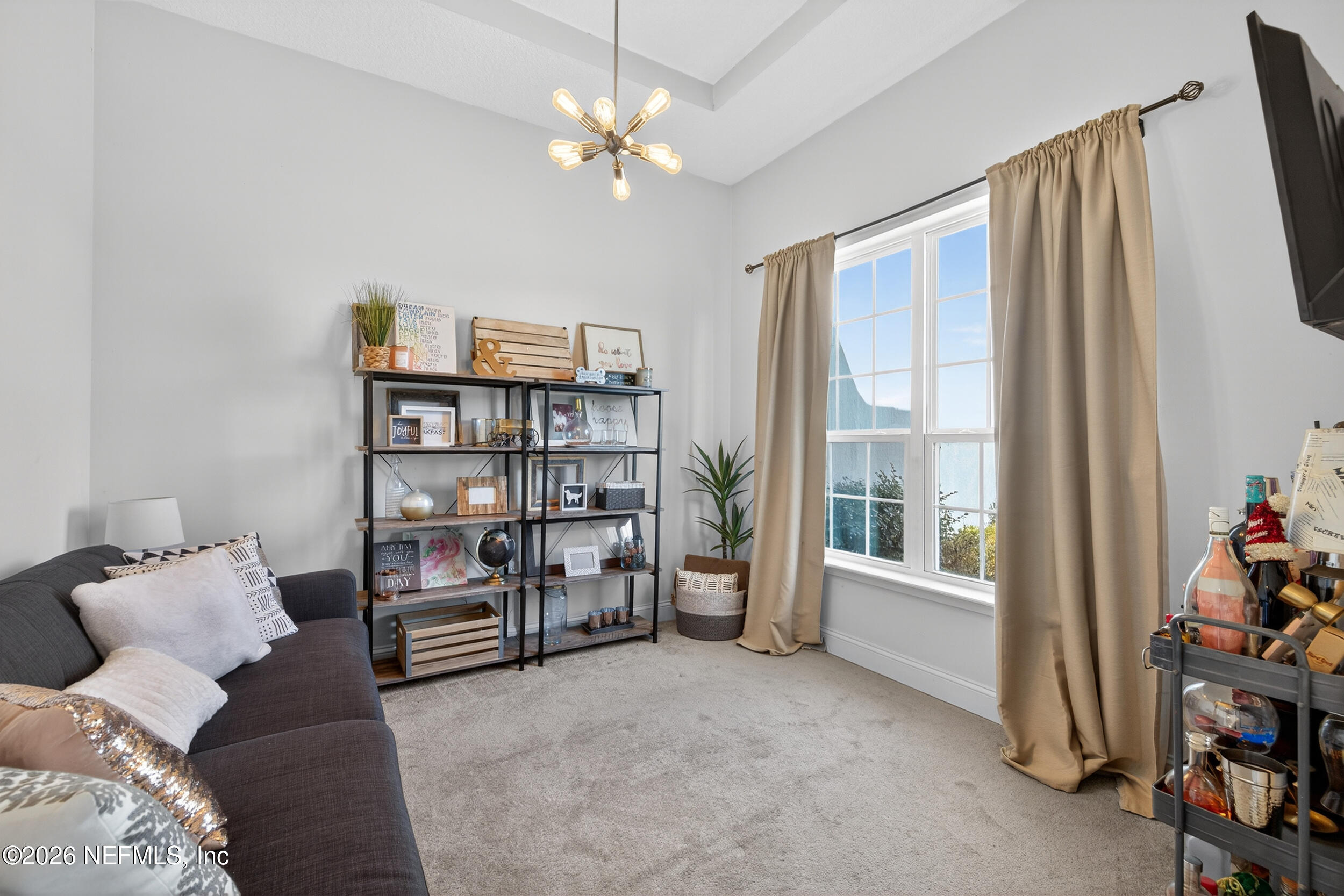 9874 Patriot Ridge Drive Jacksonville, FL 32221 - Photo 4 of 26 a view of a livingroom with a large window