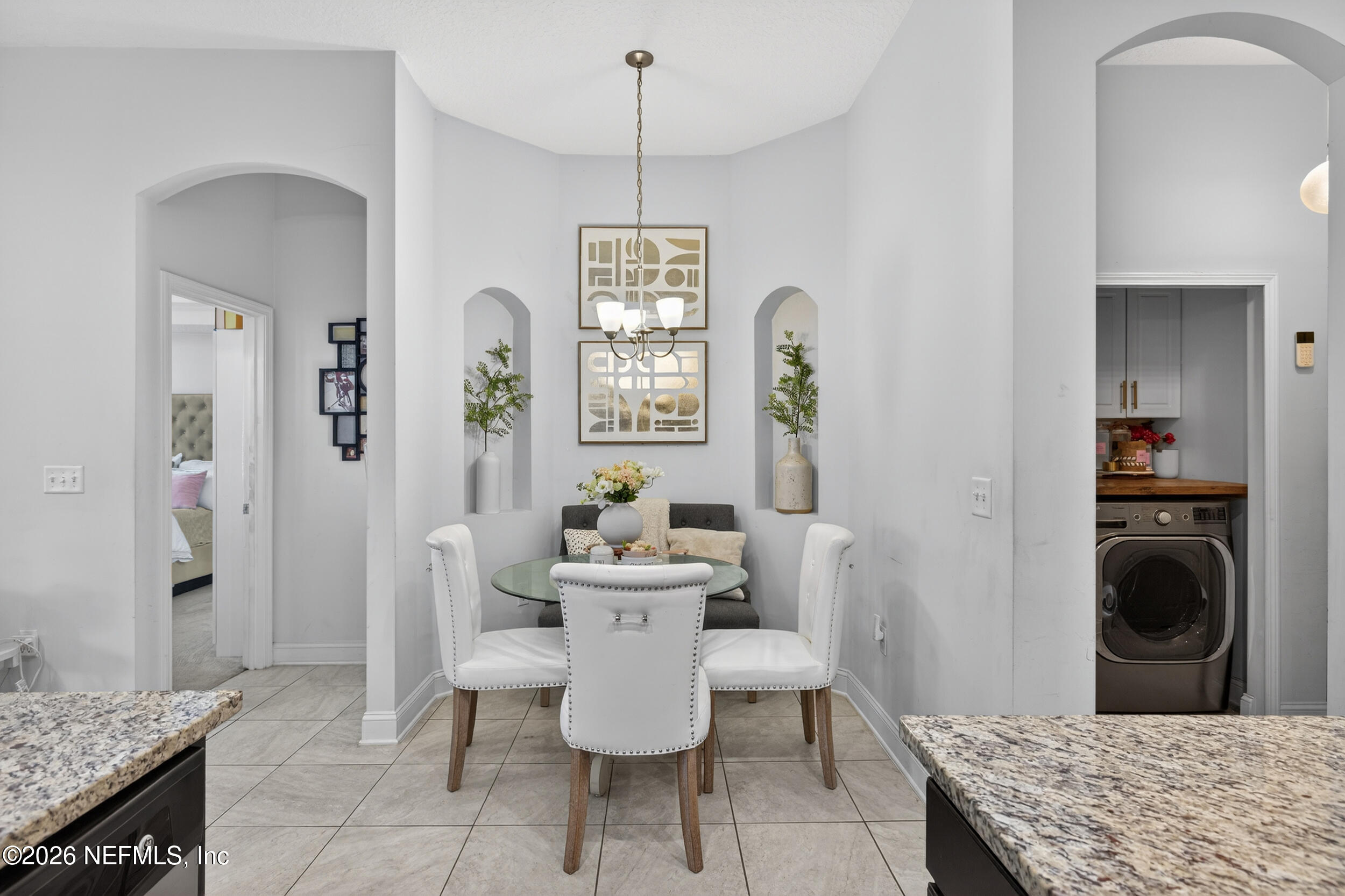 9874 Patriot Ridge Drive Jacksonville, FL 32221 - Photo 10 of 26 a living room with a couch and a table