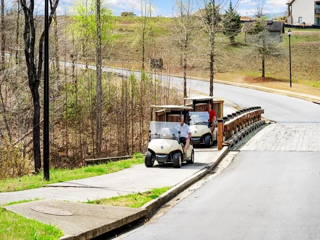 an aerial view of a house with a swimming pool yard and outdoor seating